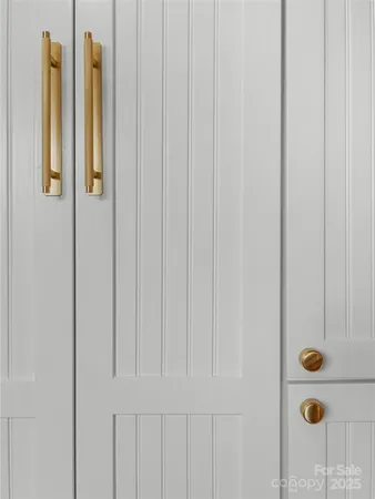 a utility room with sink dryer and washer