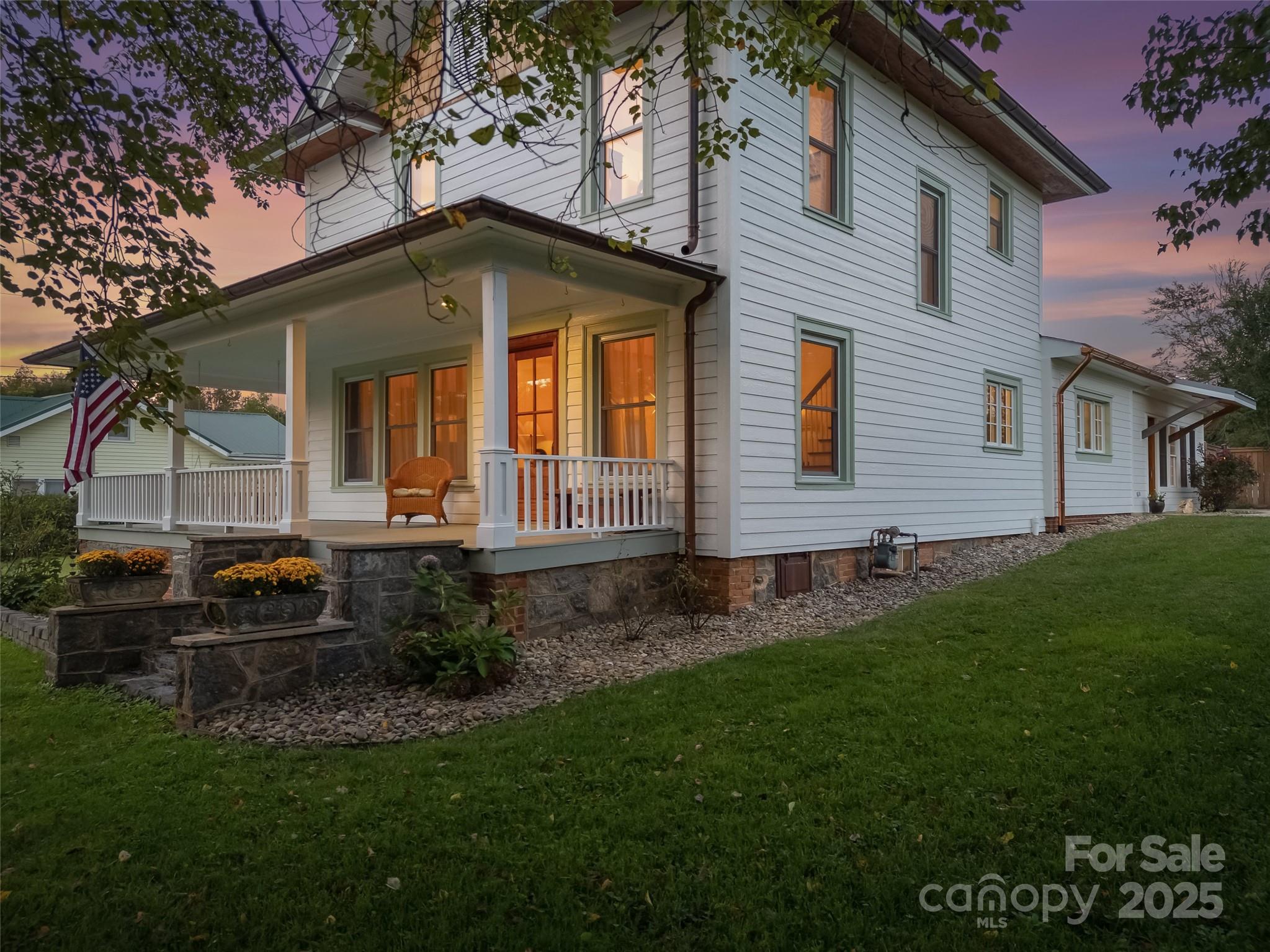 505 North Country Club Road Brevard, NC 28712 - Photo 2 of 48 a front view of a house with a garden