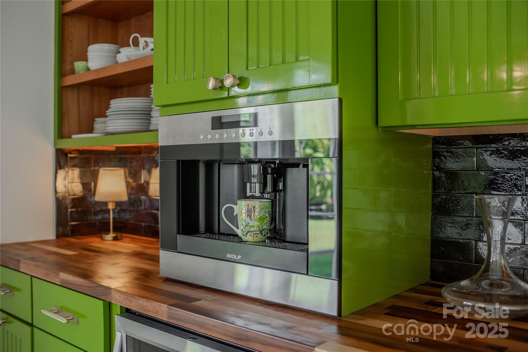 505 North Country Club Road Brevard, NC 28712 - Photo 23 of 48 a kitchen with stainless steel appliances granite countertop a stove and a refrigerator