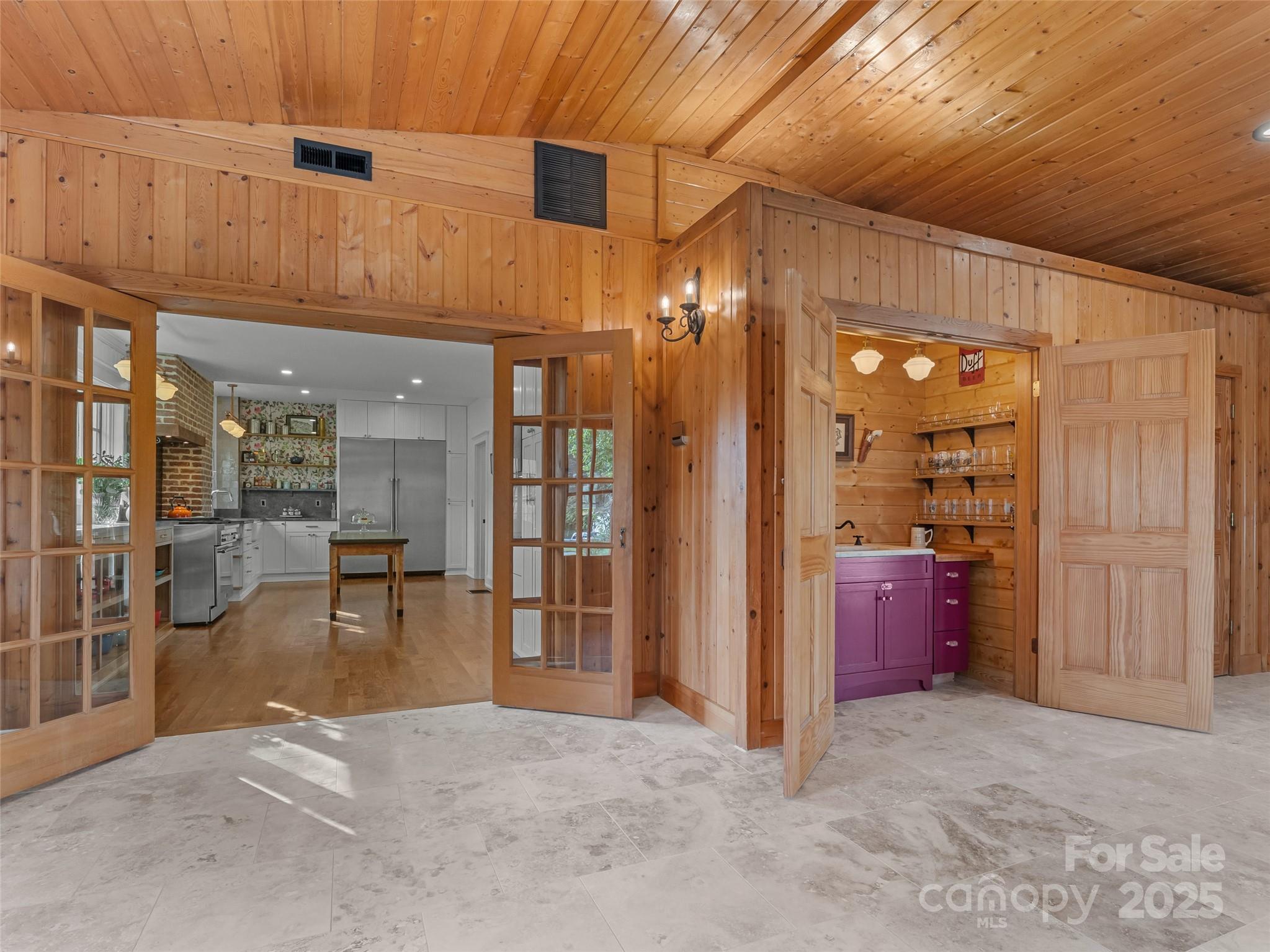 505 North Country Club Road Brevard, NC 28712 - Photo 25 of 48 an empty room with furniture and a chandelier