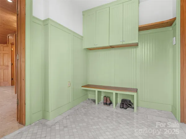 a bedroom with a bed and a desk