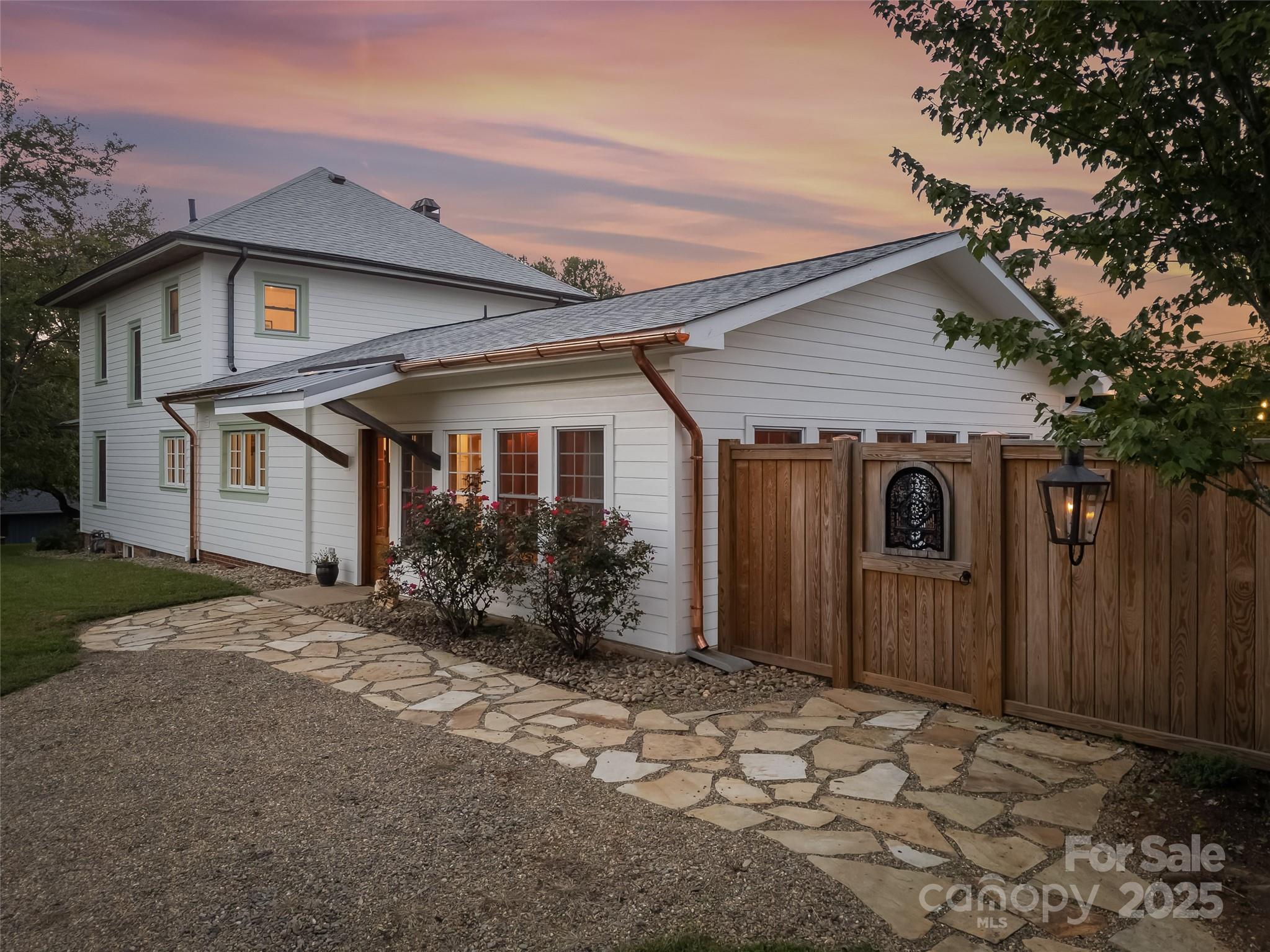 505 North Country Club Road Brevard, NC 28712 - Photo 3 of 48 a front view of a house with a yard