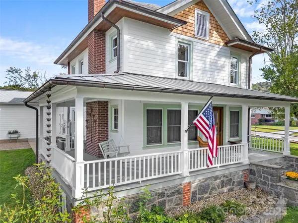 a view of a porch and garden