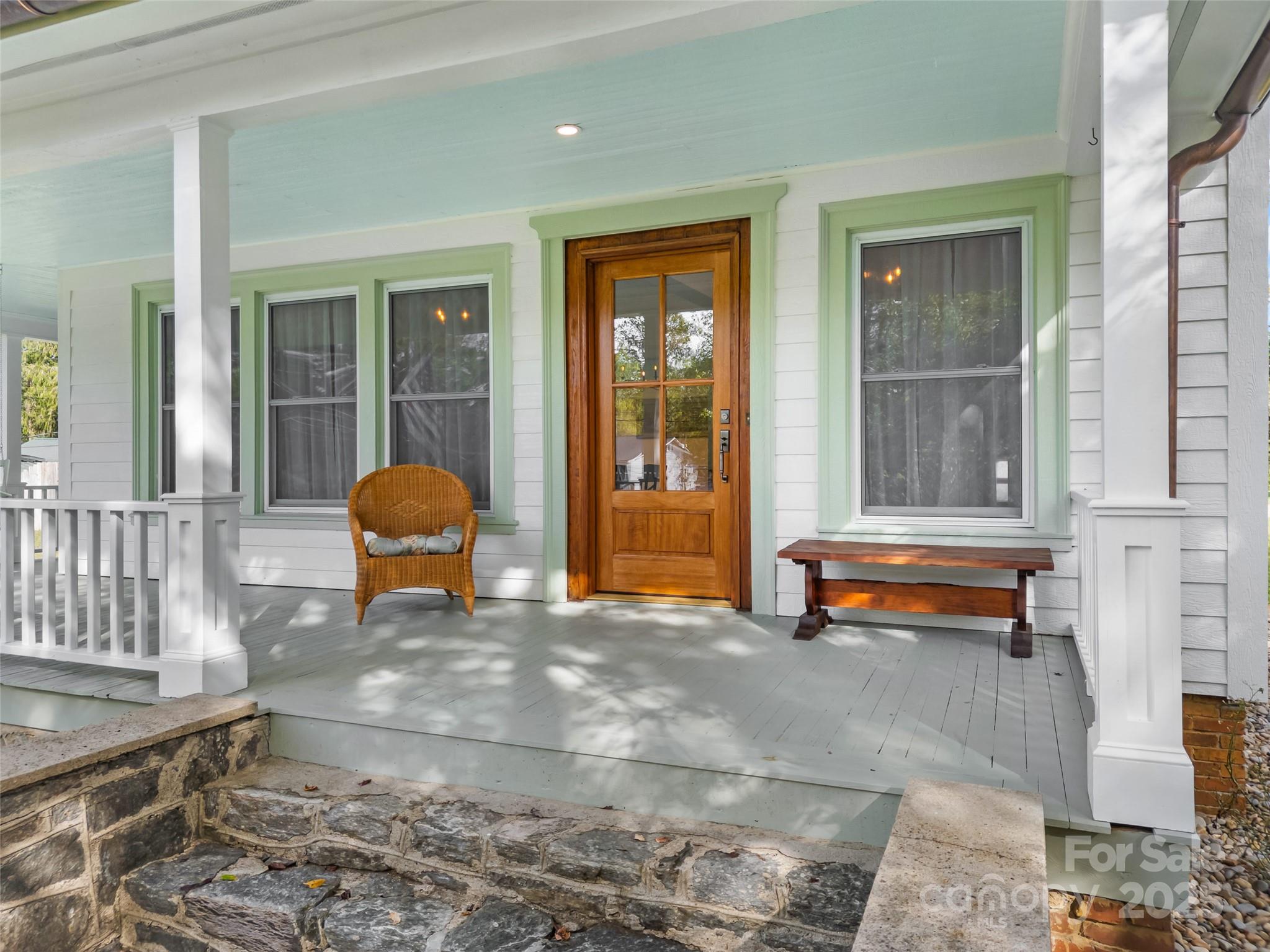 505 North Country Club Road Brevard, NC 28712 - Photo 4 of 48 a view of a two chairs in the porch