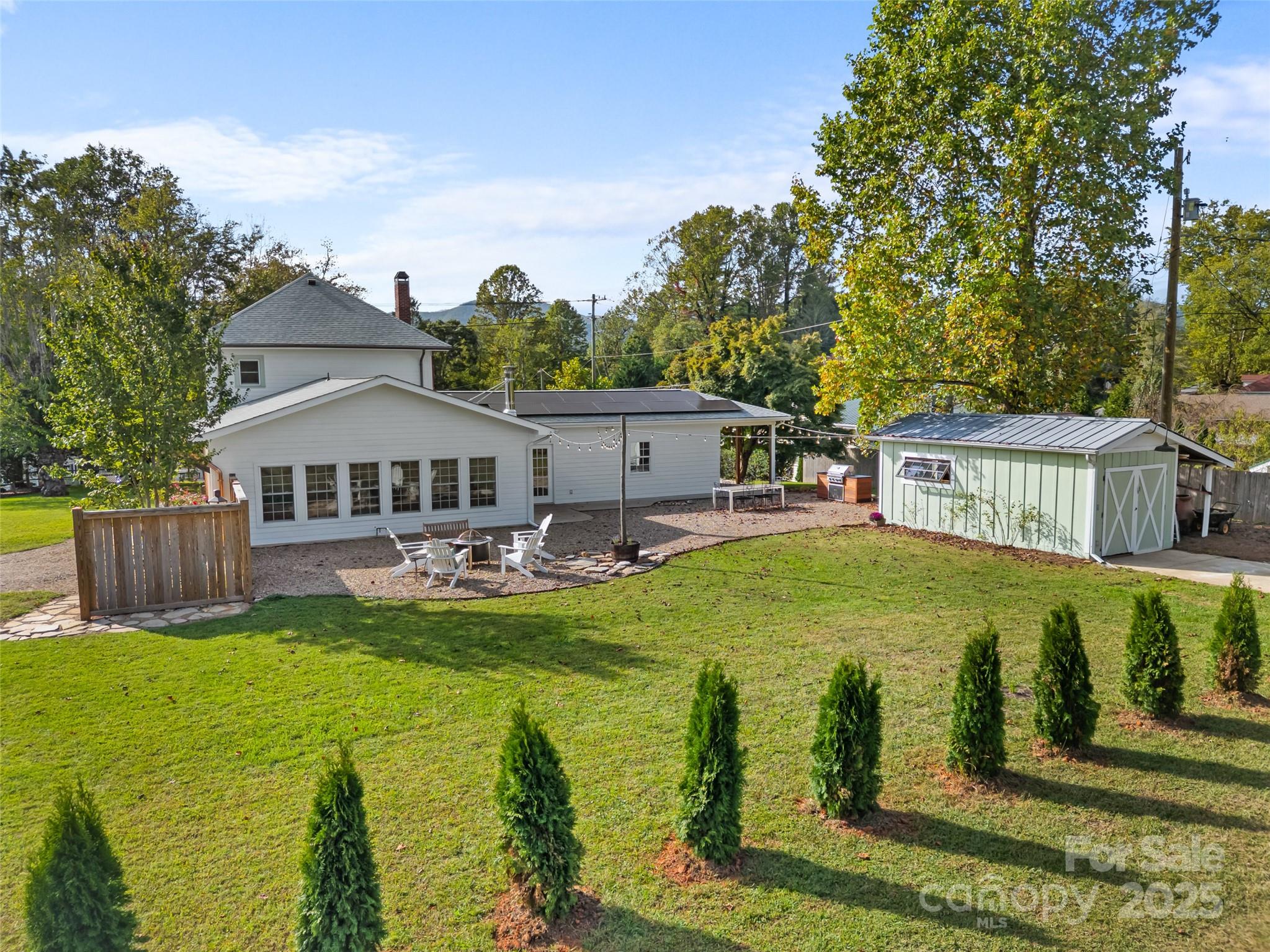 505 North Country Club Road Brevard, NC 28712 - Photo 42 of 48 a view of a house with pool and chairs