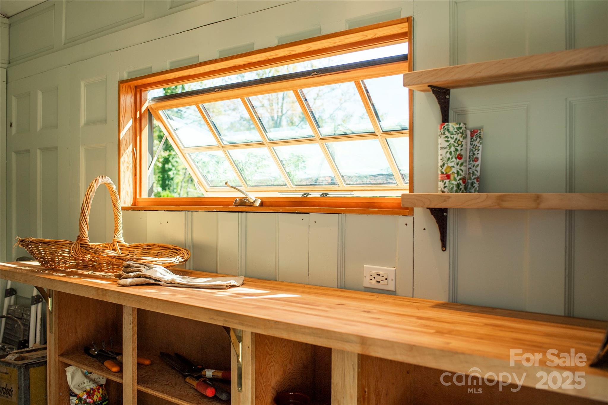 505 North Country Club Road Brevard, NC 28712 - Photo 45 of 48 a bathroom with a sink and a window
