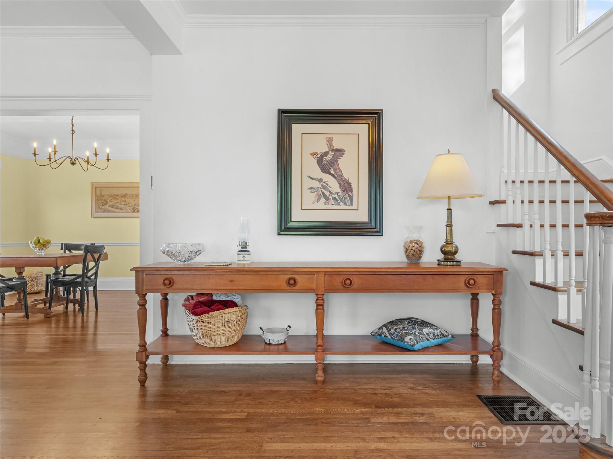 505 North Country Club Road Brevard, NC 28712 - Photo 5 of 48 a view of a dining room with furniture a chandelier and wooden floor