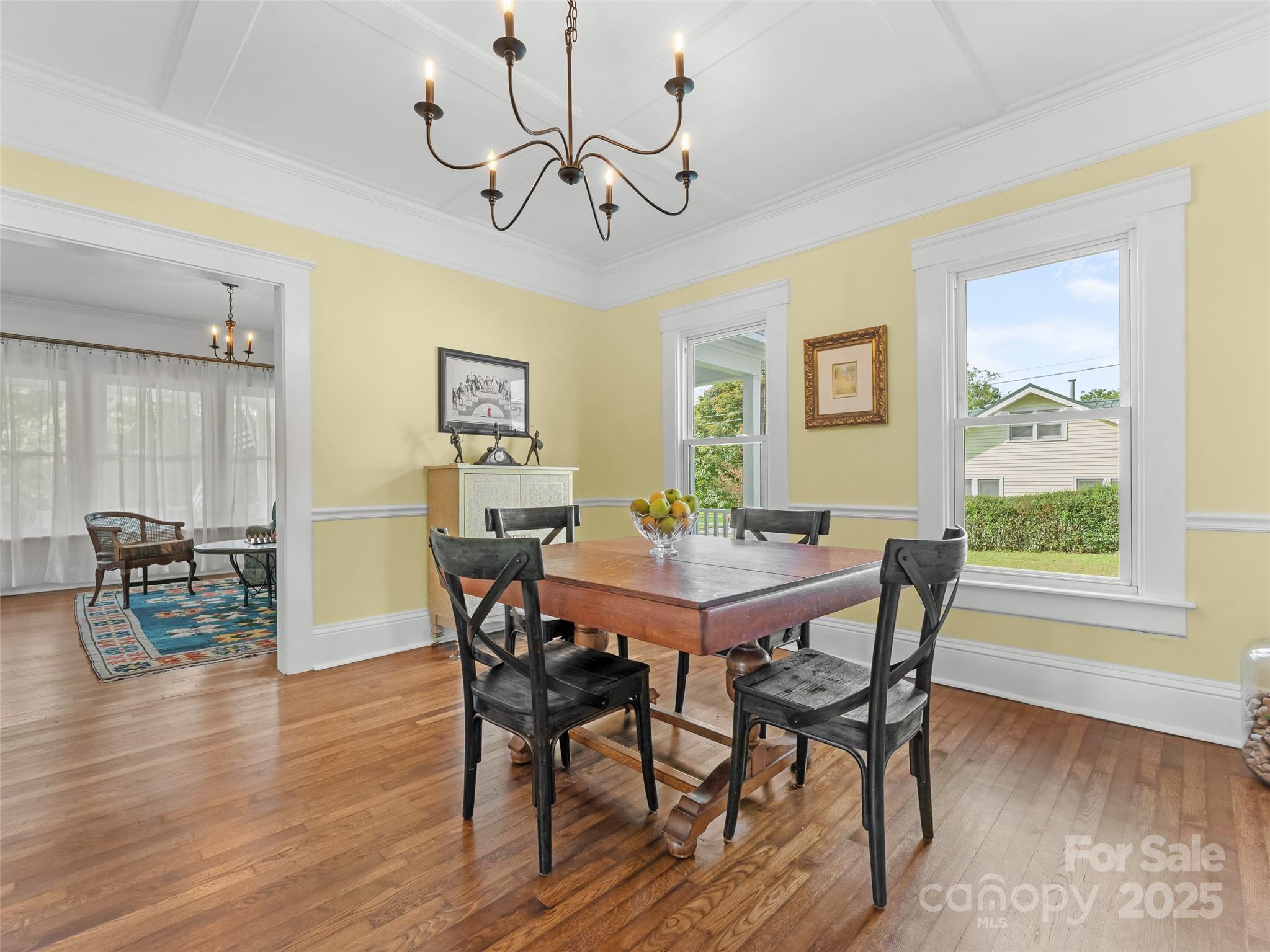 505 North Country Club Road Brevard, NC 28712 - Photo 10 of 48 a view of a dining room with furniture window and wooden floor