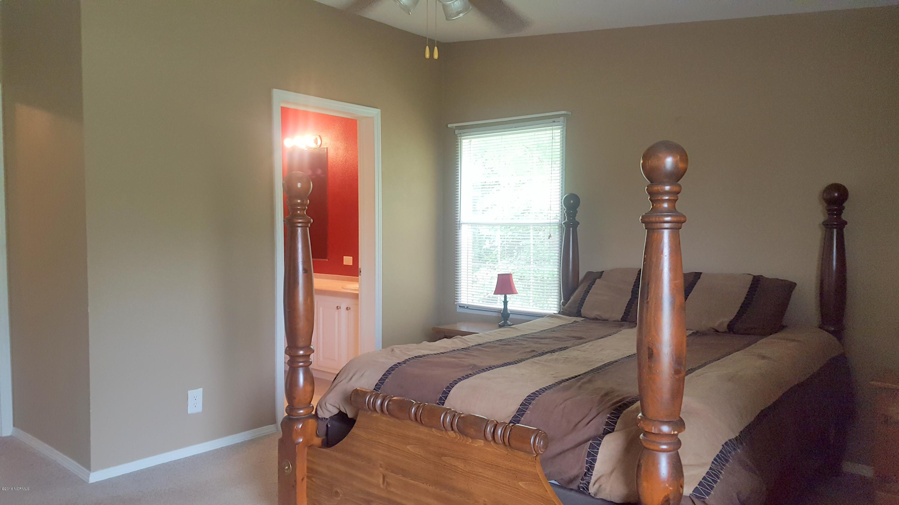 5063 Blueberry Road Currie, NC 28435 - Photo 7 of 11 5063 Blueberry Road Bedroom