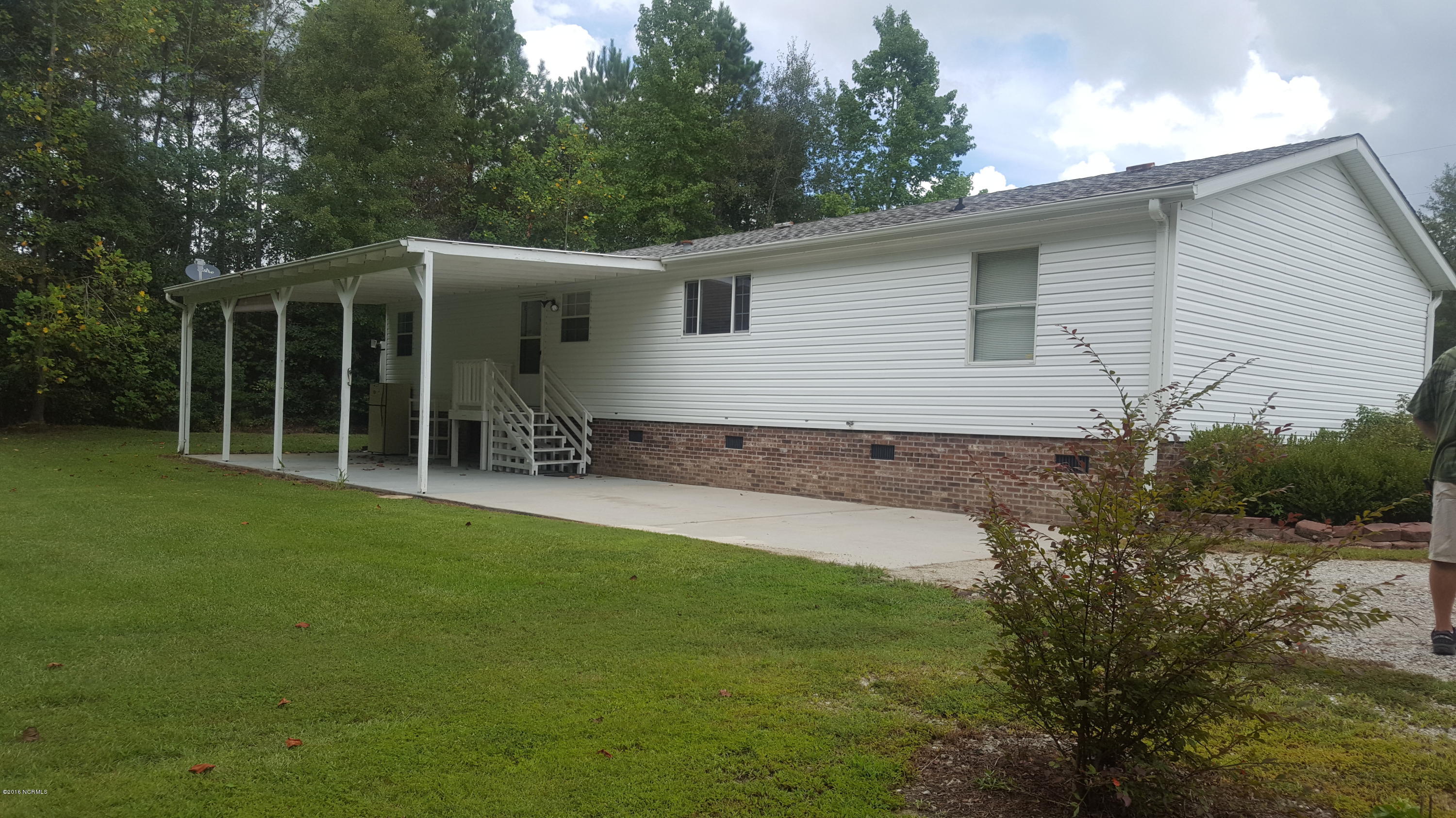 5063 Blueberry Road Currie, NC 28435 - Photo 8 of 11 5063 Blueberry Road Back
