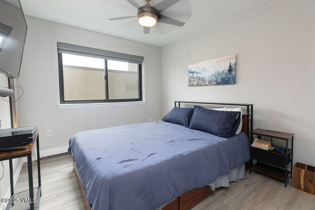 216 Main Street, Unit R316 Edwards, CO 81632 - Photo 11 of 12 a bedroom with a bed and a window