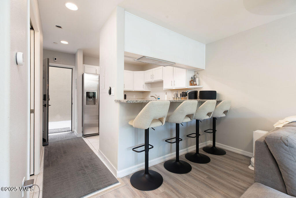 216 Main Street, Unit R316 Edwards, CO 81632 - Photo 6 of 12 a view of livingroom and dining room with furniture