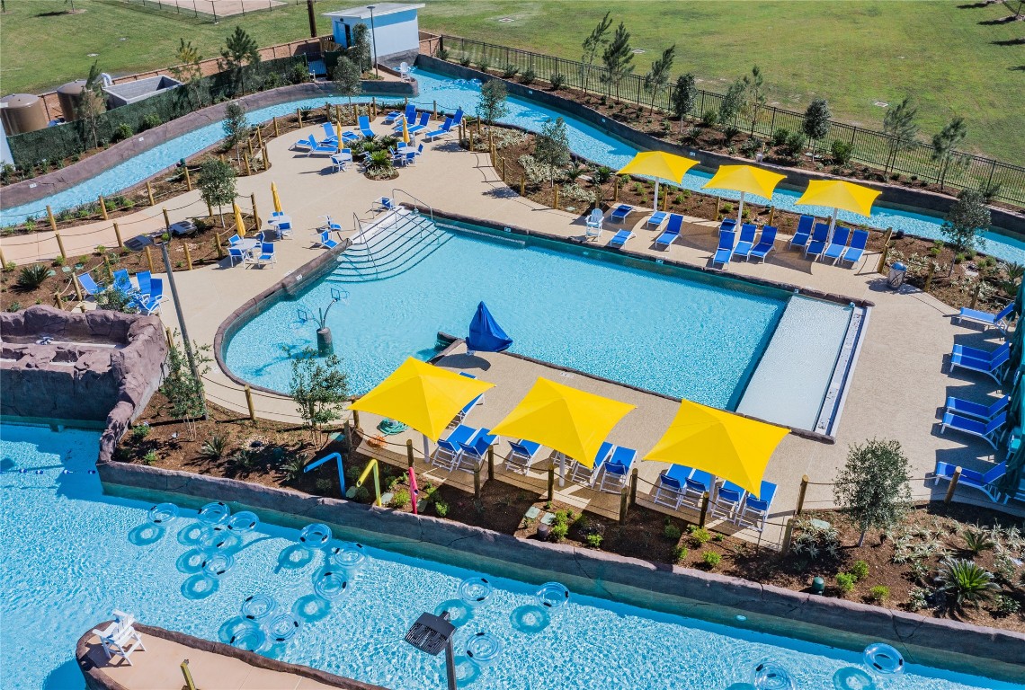 4946 Hitchings Court Rosharon, TX 77583 - Photo 38 of 49 This aerial view showcases the property's amenities, including a lazy river, wave pool, family pool, cabanas, lounges, and many other features.