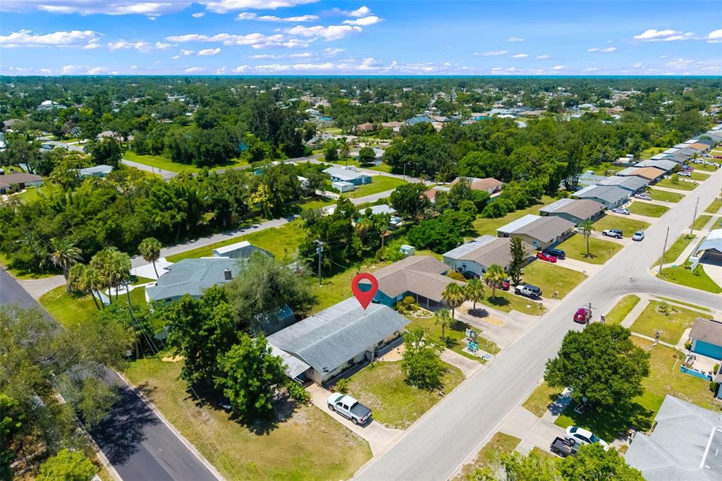 528 Briarwood Road Venice, FL 34293 - Photo 22 of 44 an aerial view of residential houses with outdoor space and trees all around
