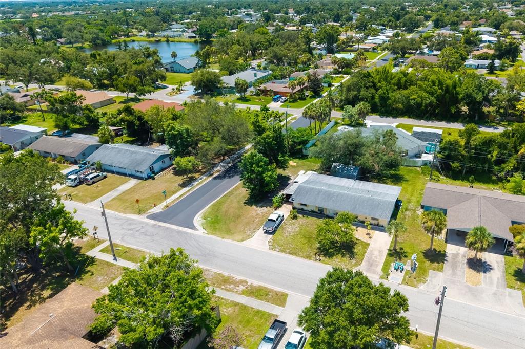 528 Briarwood Road Venice, FL 34293 - Photo 23 of 44 an aerial view of house with yard swimming pool and outdoor seating