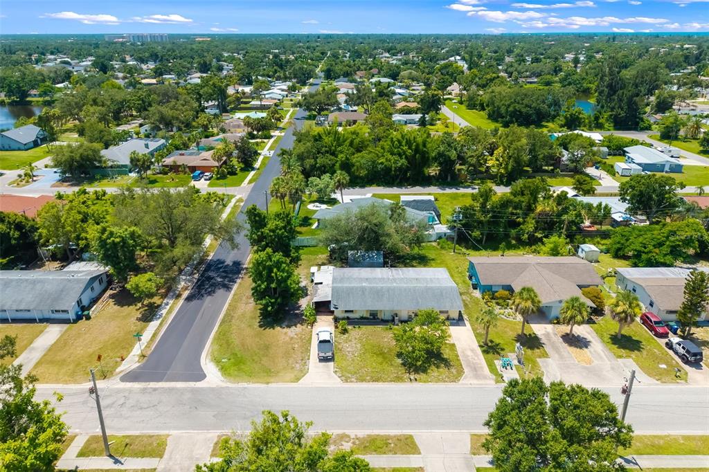 528 Briarwood Road Venice, FL 34293 - Photo 24 of 44 an aerial view of residential houses with outdoor space and street view