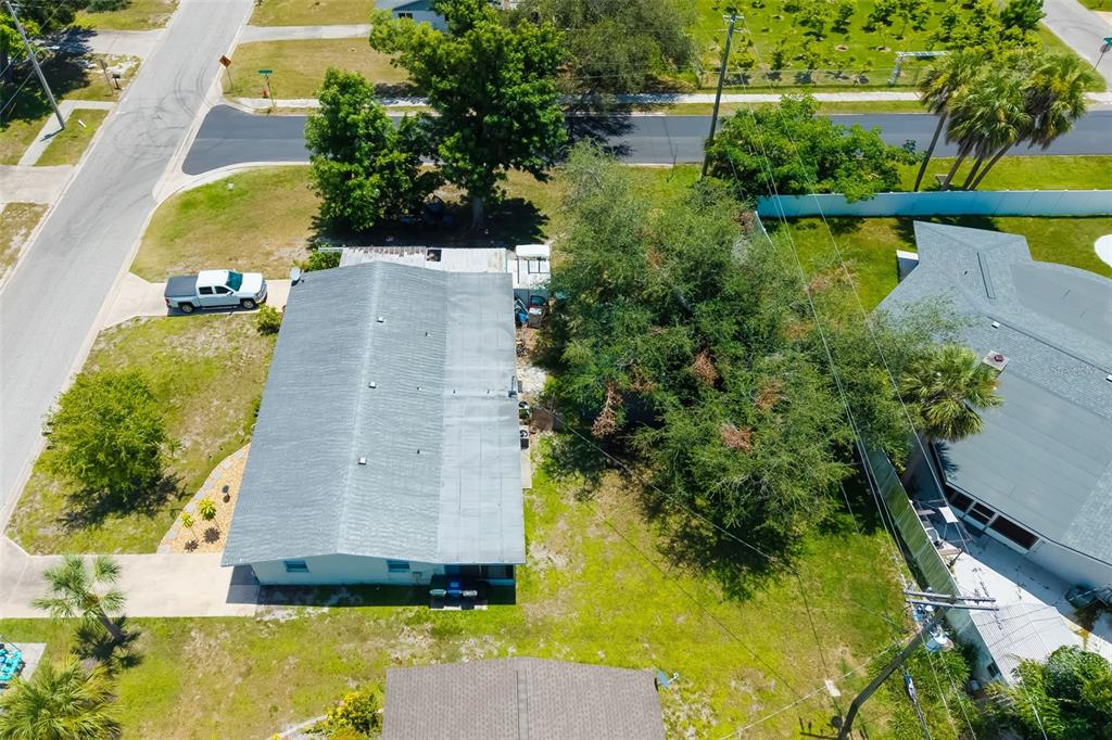 528 Briarwood Road Venice, FL 34293 - Photo 27 of 44 an aerial view of a house with a yard swimming pool and outdoor seating