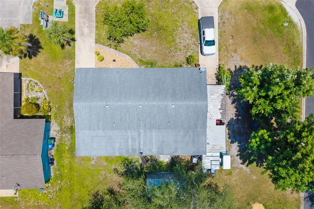 528 Briarwood Road Venice, FL 34293 - Photo 29 of 44 an aerial view of a house with a yard