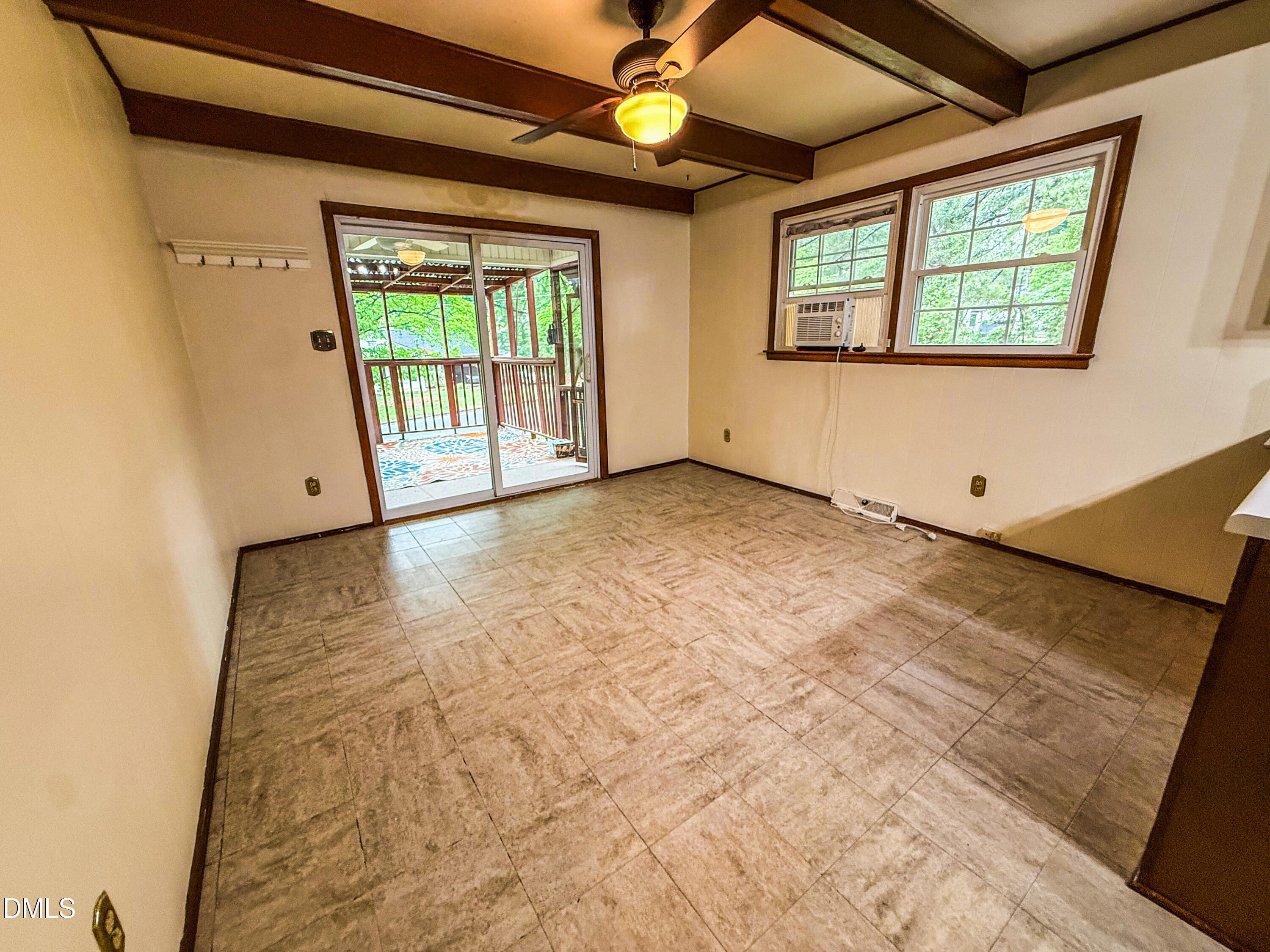 4717 Radcliff Road Raleigh, NC 27609 - Photo 4 of 11 a view of an empty room with a window