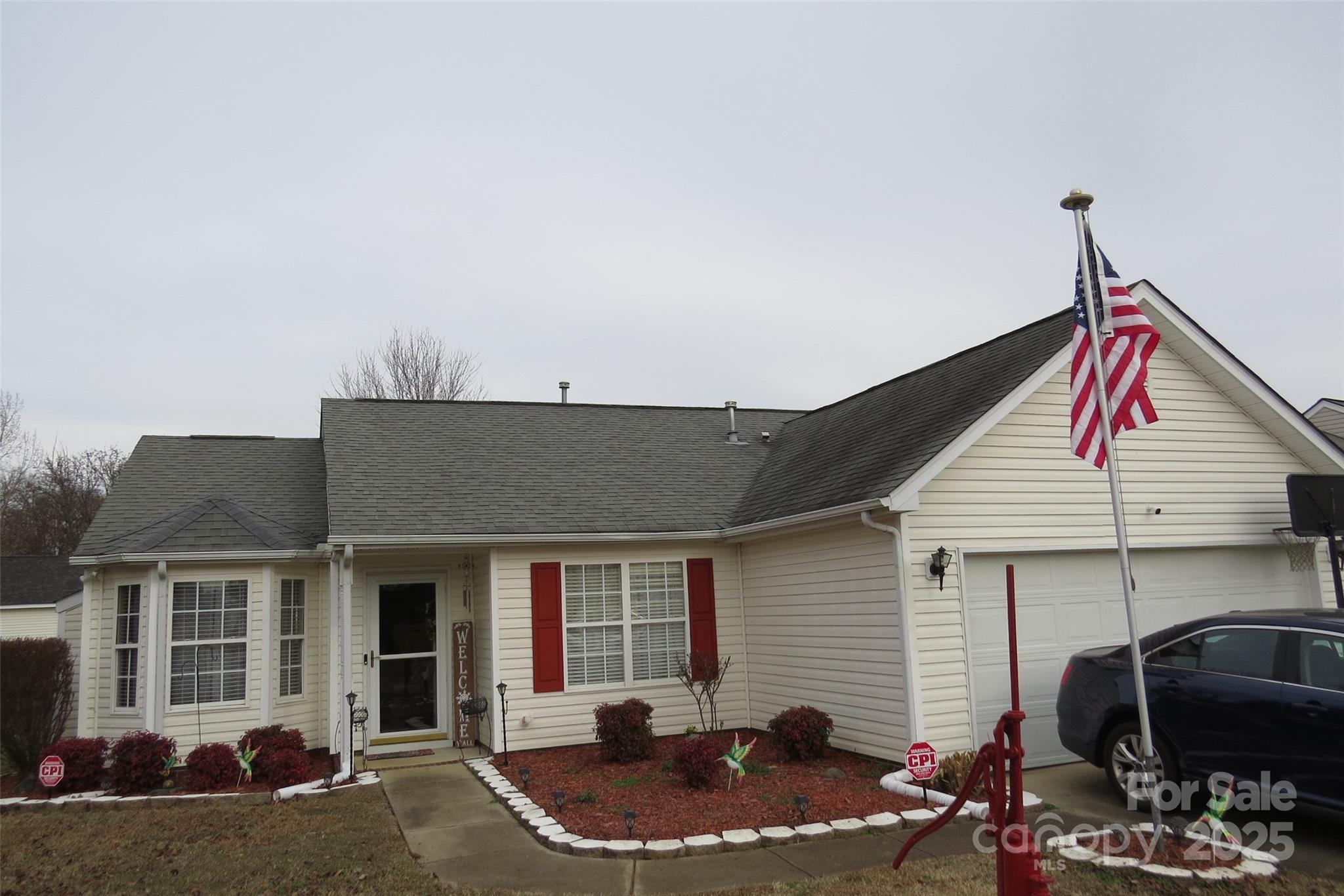 a backyard of a house with seating space