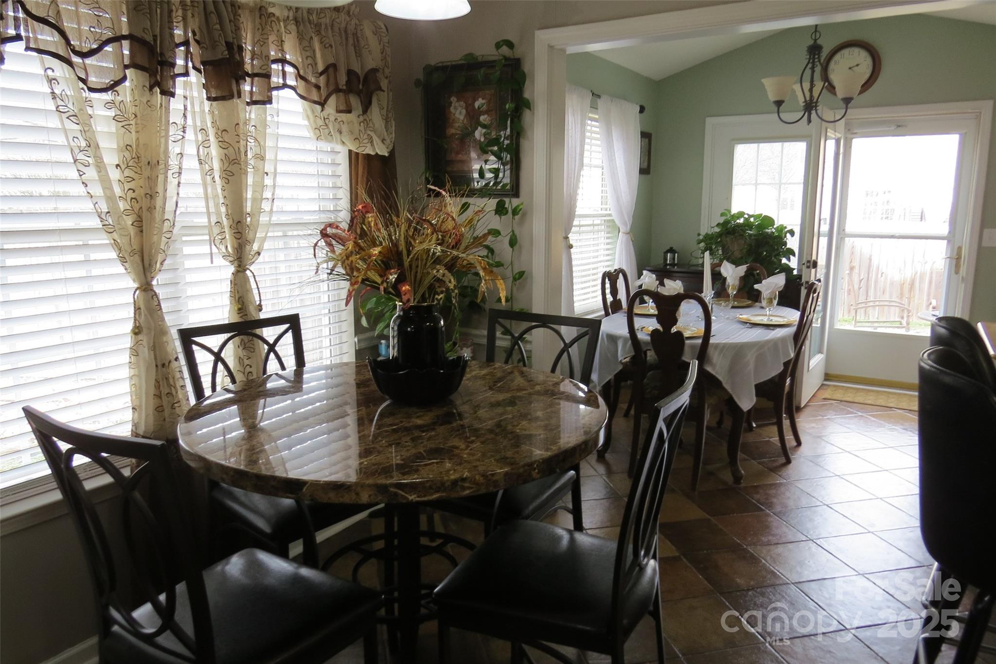 2901 Compton Court Northwest Concord, NC 28027 - Photo 11 of 35 a view of a dining room with furniture and window