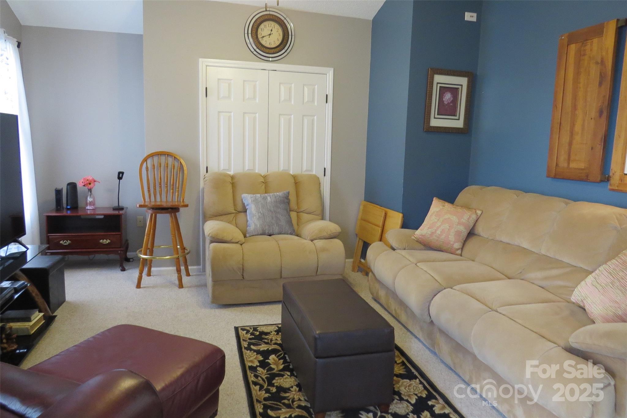 2901 Compton Court Northwest Concord, NC 28027 - Photo 17 of 35 a living room with furniture and a window