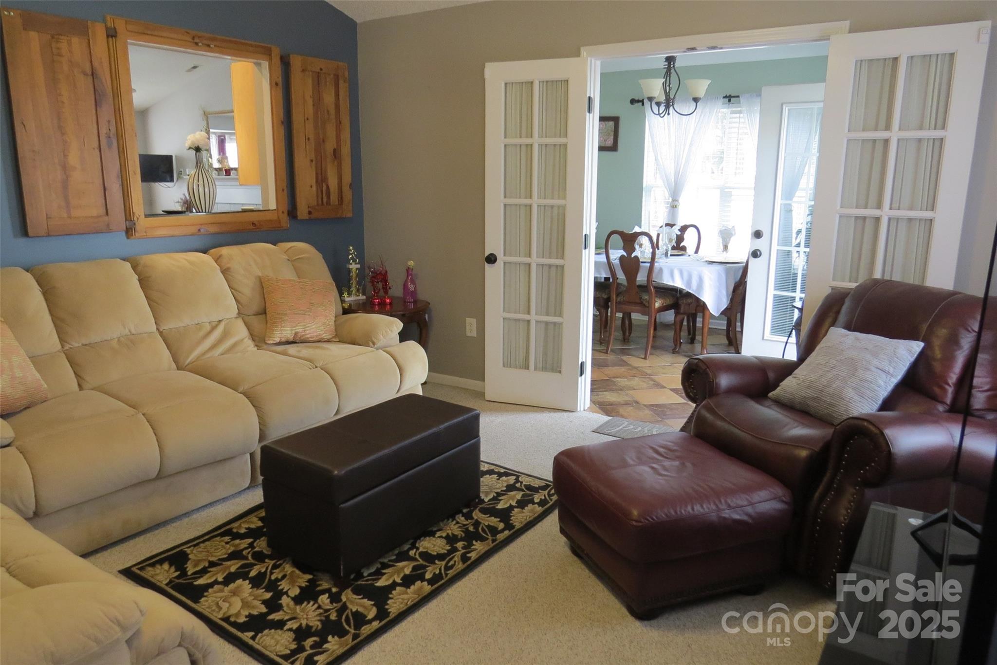2901 Compton Court Northwest Concord, NC 28027 - Photo 19 of 35 a living room with furniture ceiling fan and a window