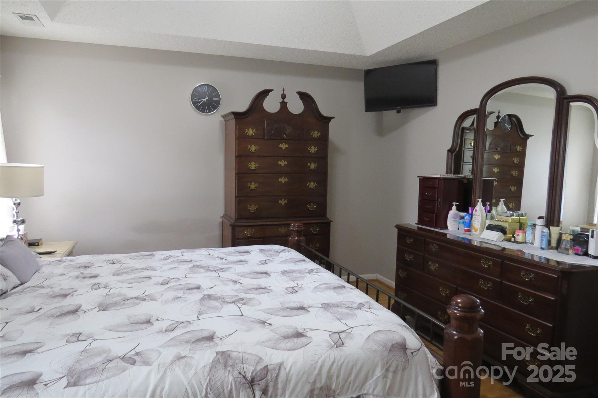 2901 Compton Court Northwest Concord, NC 28027 - Photo 22 of 35 a bedroom with a bed and a dresser