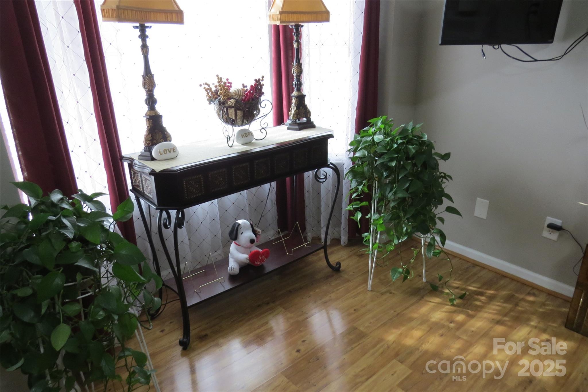 2901 Compton Court Northwest Concord, NC 28027 - Photo 4 of 35 a room with furniture and a potted plant