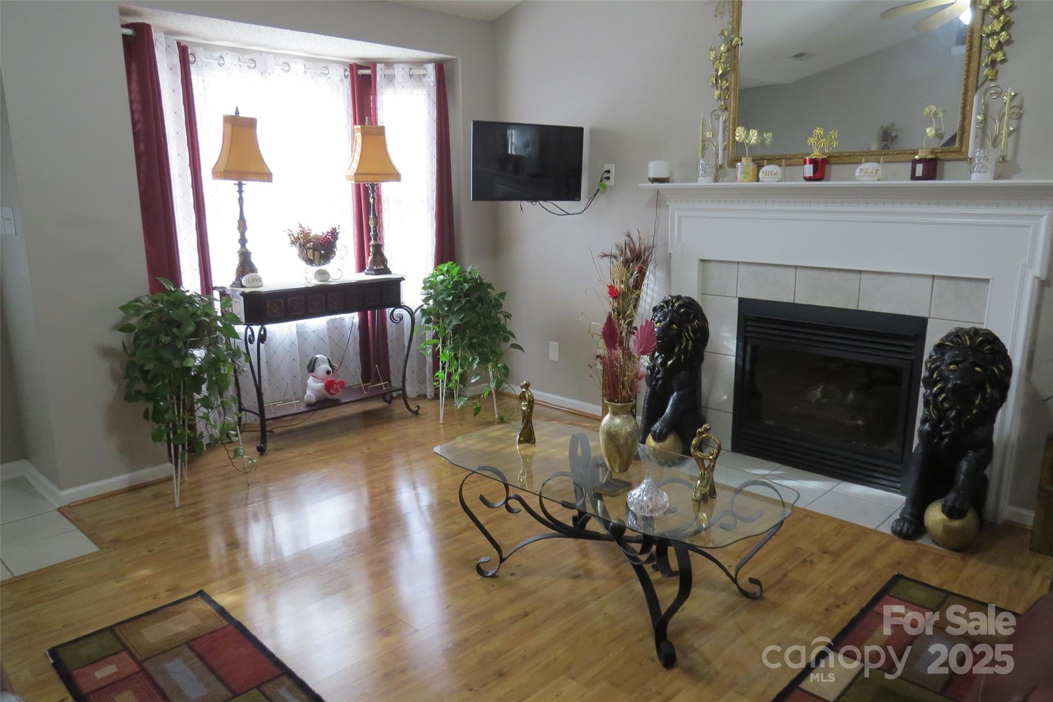 2901 Compton Court Northwest Concord, NC 28027 - Photo 5 of 35 a living room with furniture and a fireplace