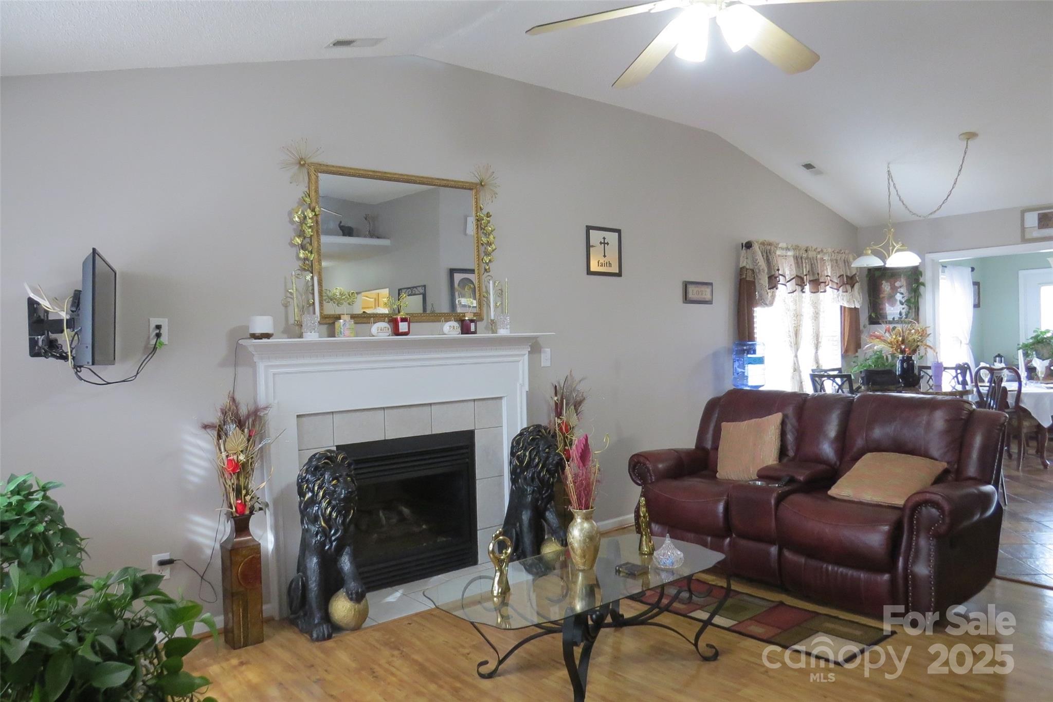 2901 Compton Court Northwest Concord, NC 28027 - Photo 9 of 35 a living room with furniture and a fireplace