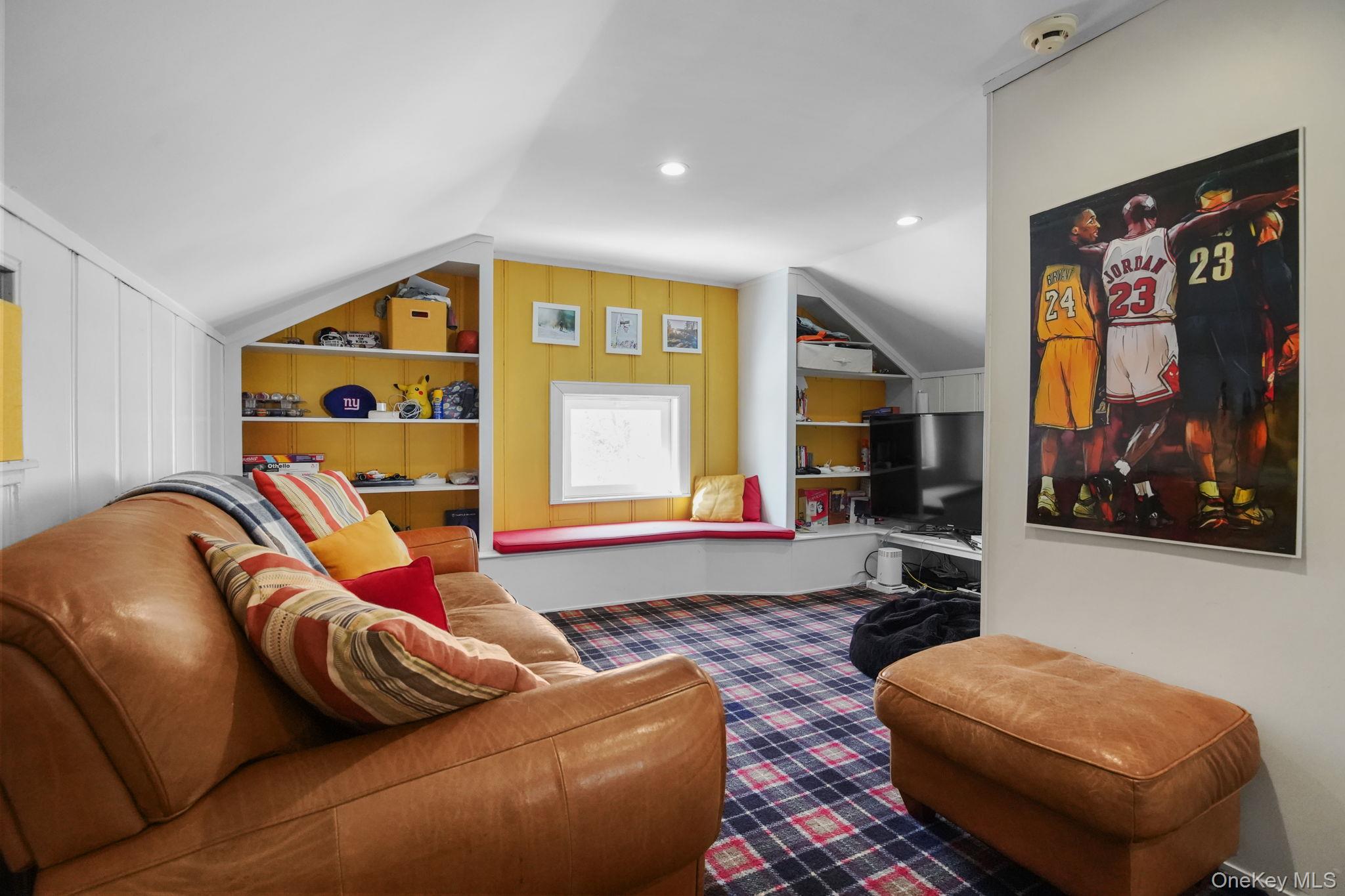 181 Webster Road Scarsdale, NY 10583 - Photo 25 of 30 a living room with furniture and a flat screen tv