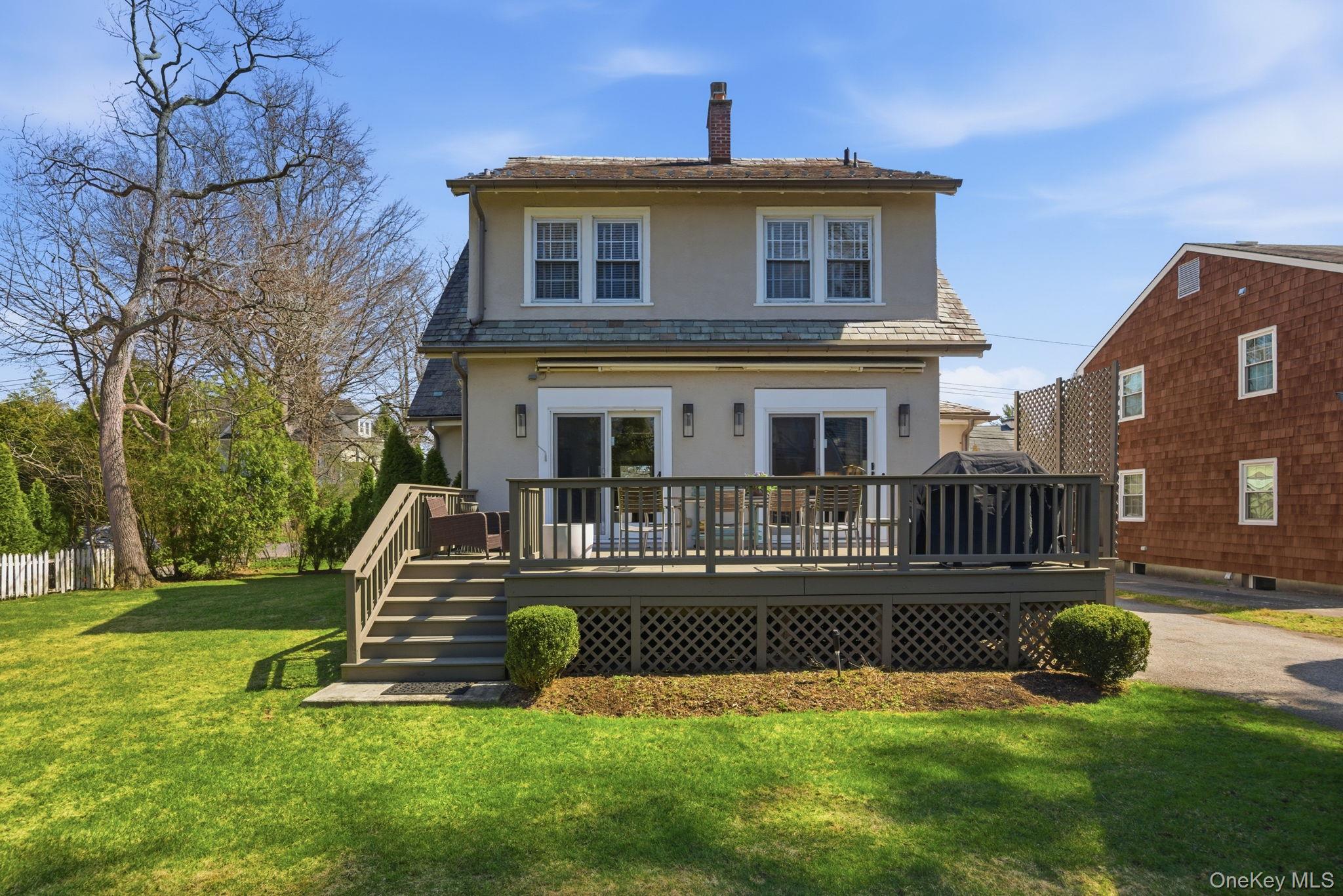 181 Webster Road Scarsdale, NY 10583 - Photo 3 of 30 Access from the Dining Room and Kitchen to lovely deck