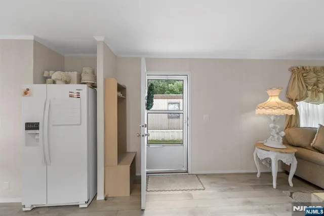 a white refrigerator freezer sitting in a room