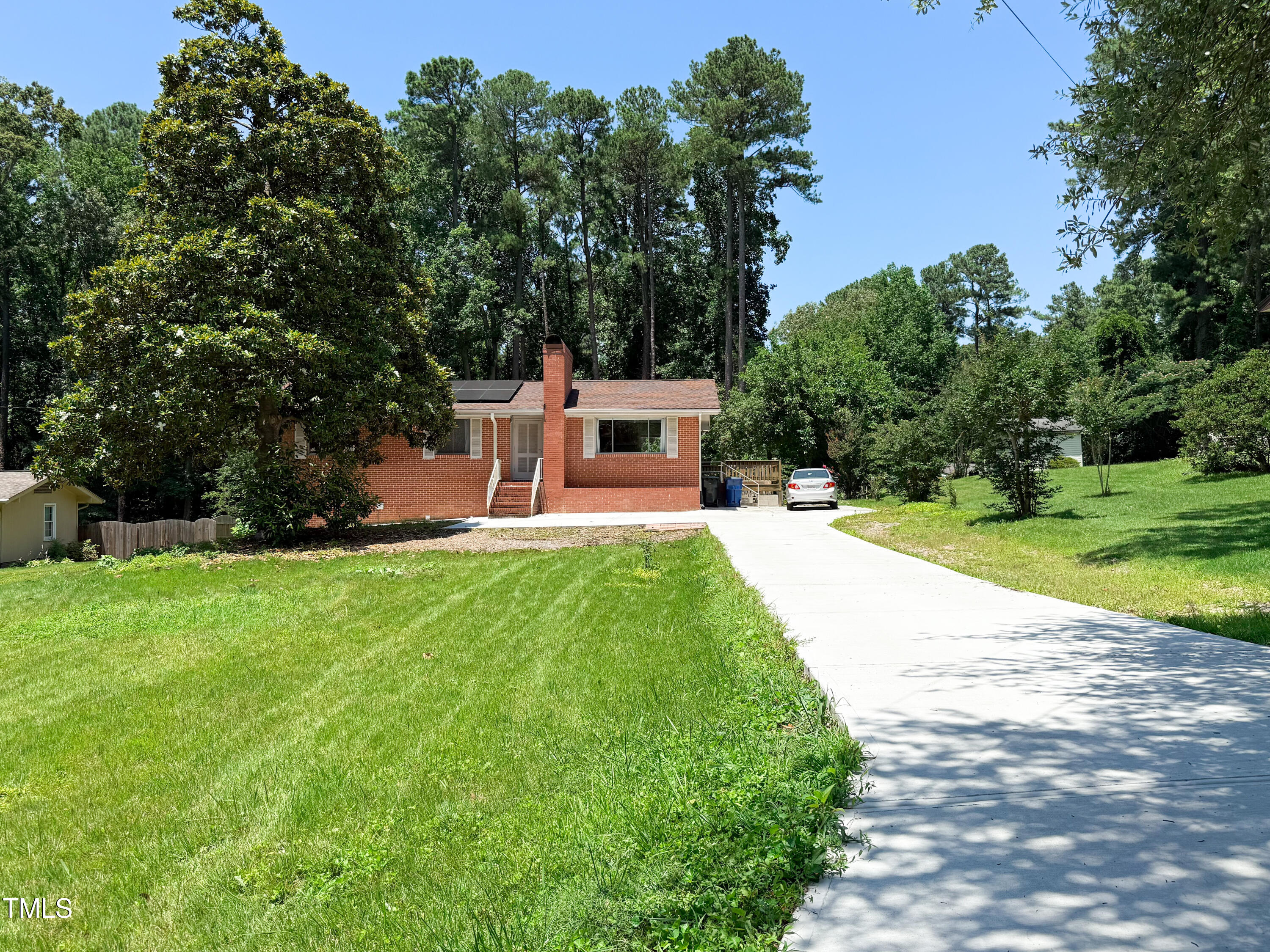 3323 Baugh Street Raleigh, NC 27604 - Photo 1 of 52 a view of a house with a backyard