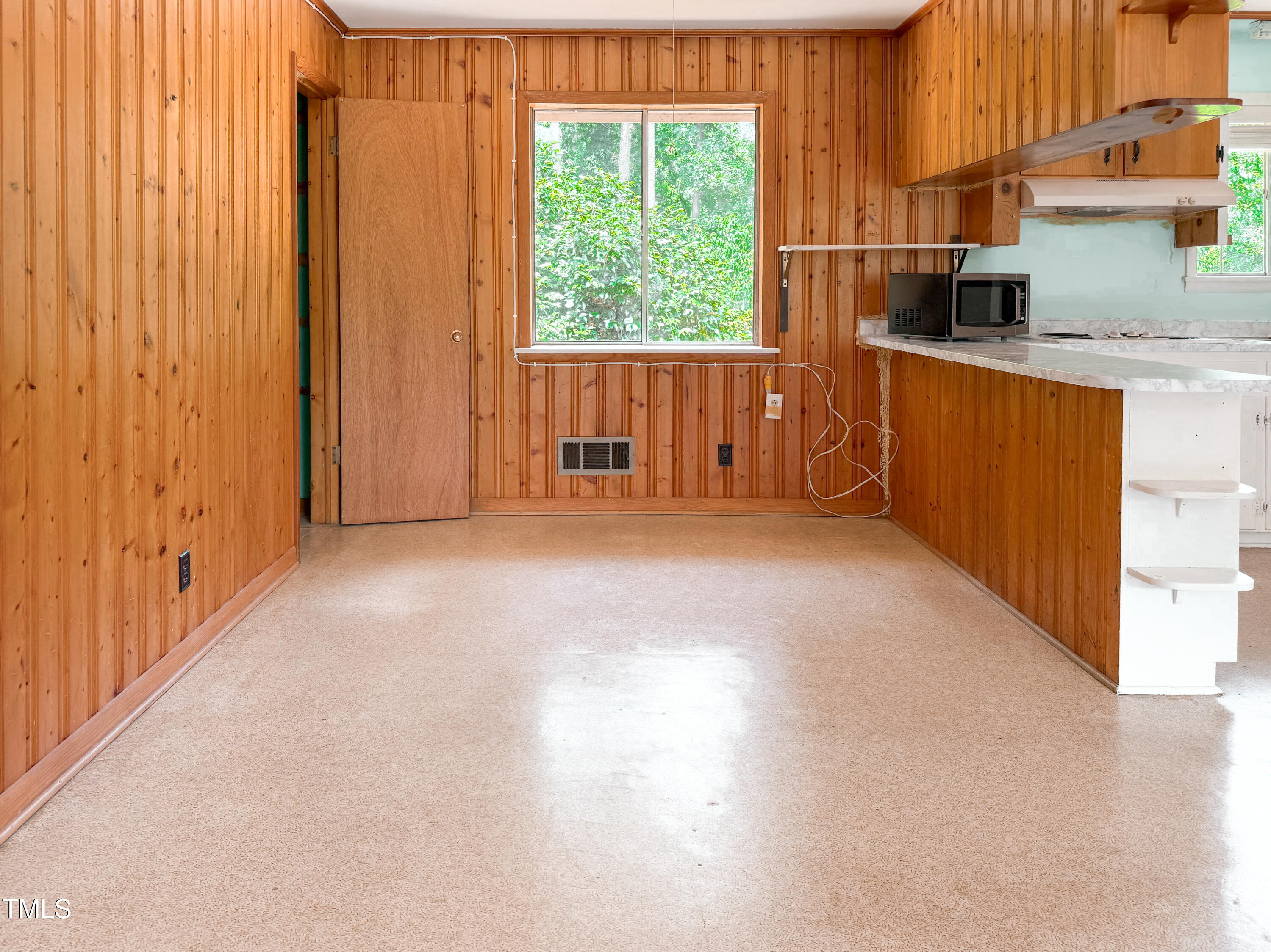 3323 Baugh Street Raleigh, NC 27604 - Photo 16 of 52 an empty room with windows