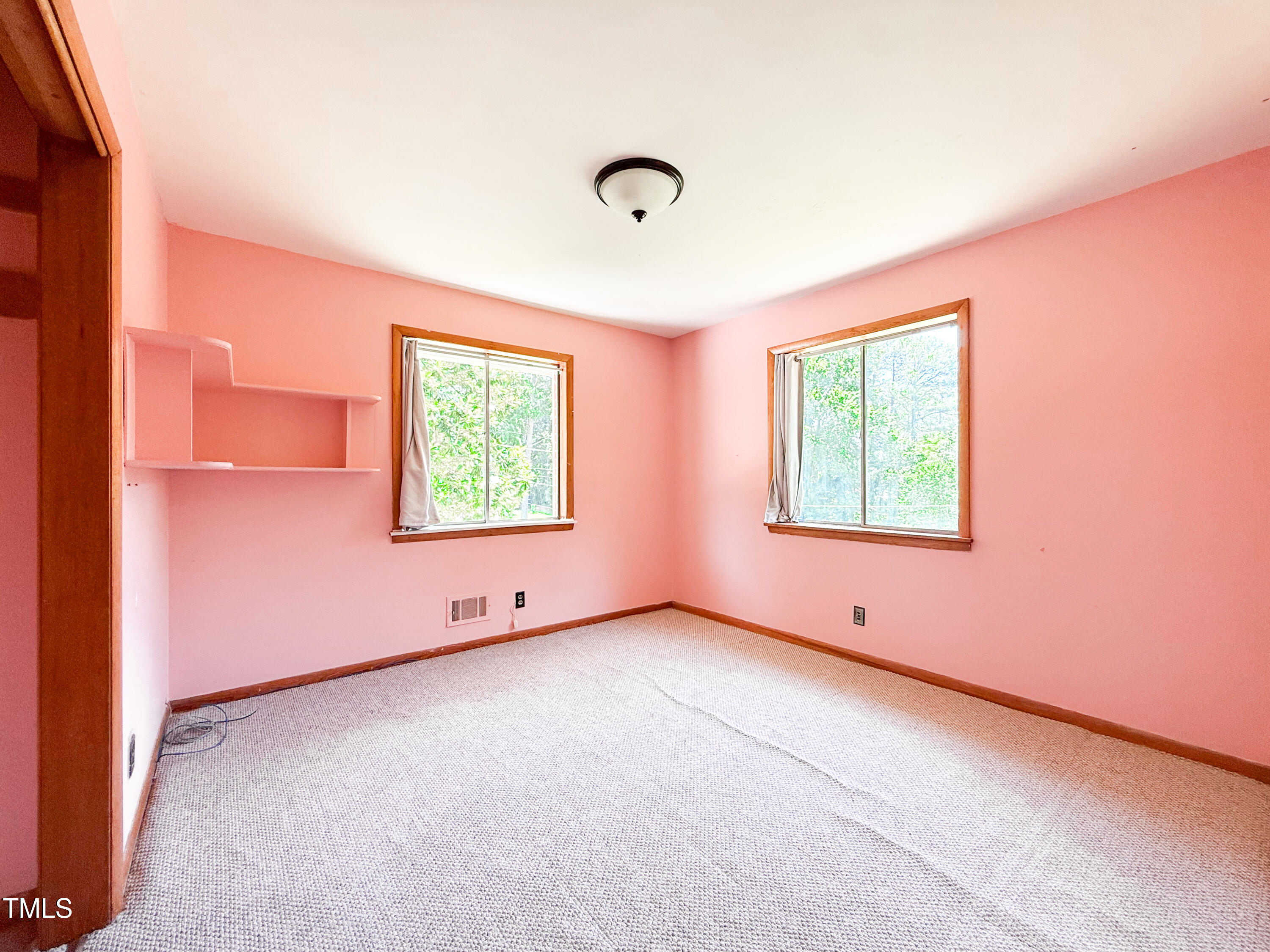 3323 Baugh Street Raleigh, NC 27604 - Photo 23 of 52 an empty room with windows