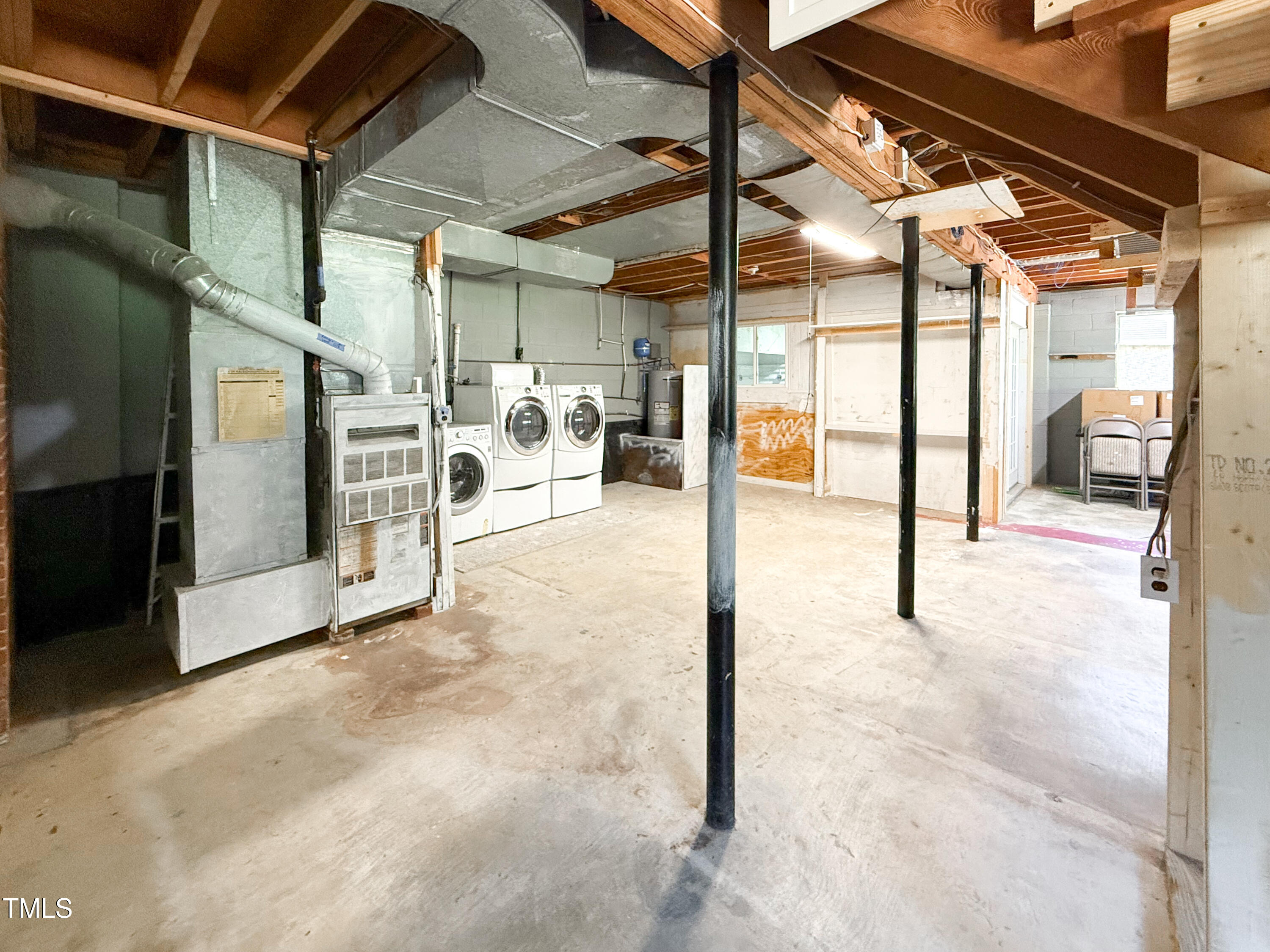 3323 Baugh Street Raleigh, NC 27604 - Photo 37 of 52 a view of a indoor garage