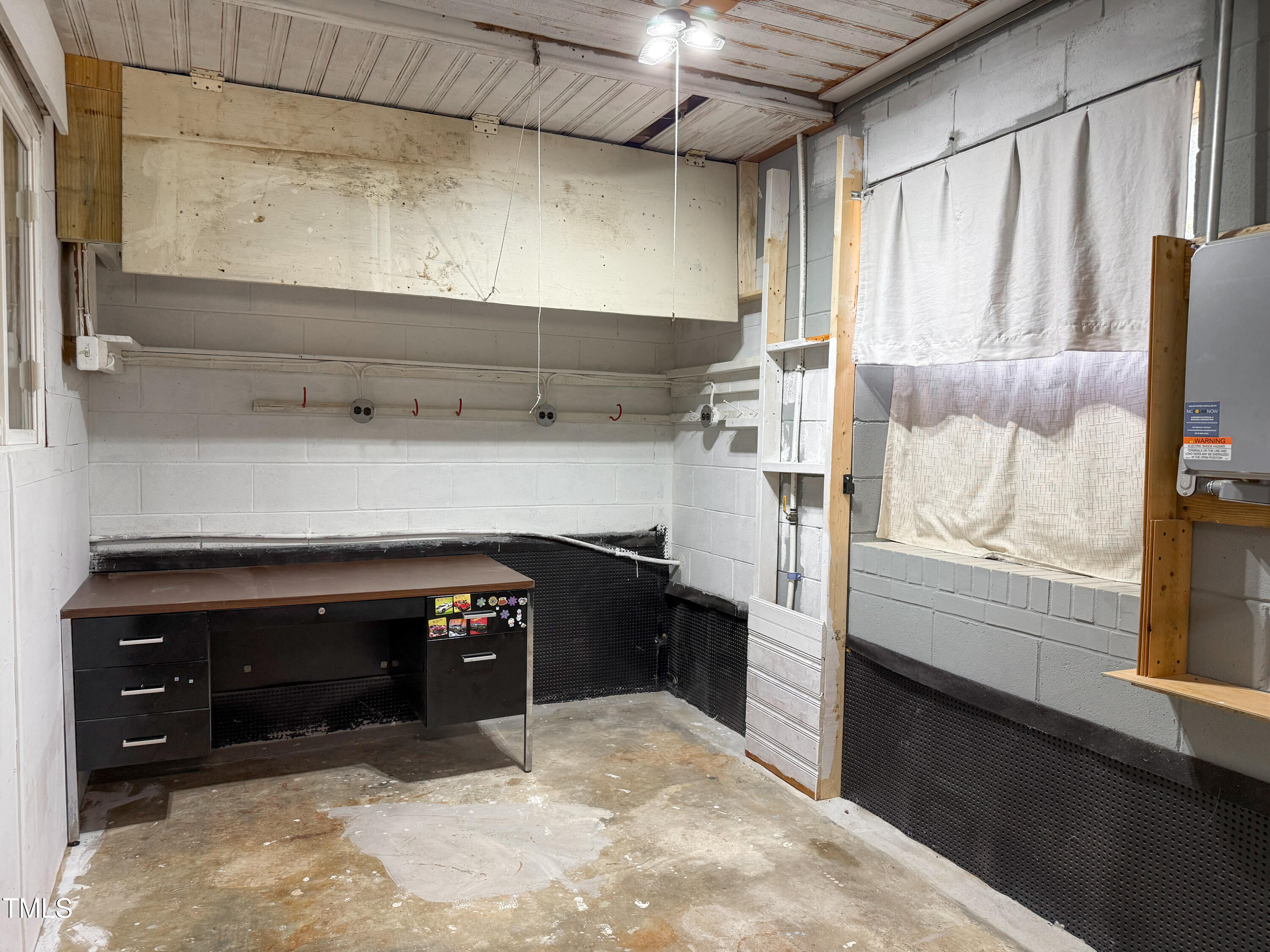 3323 Baugh Street Raleigh, NC 27604 - Photo 41 of 52 a kitchen with a refrigerator and a window