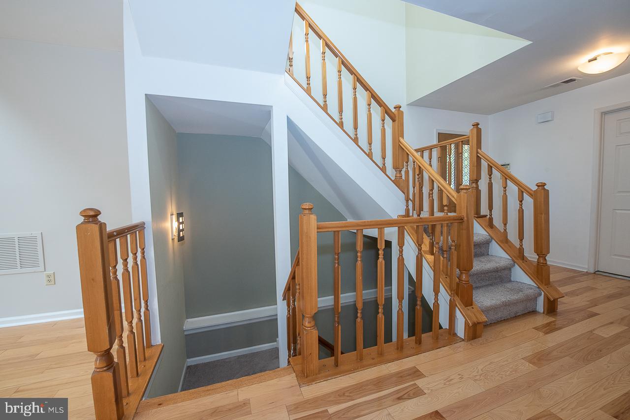 66 Main Street Chesterbrook, PA 19087 - Photo 19 of 37 Turned Staircases to Lower and Upper Levels