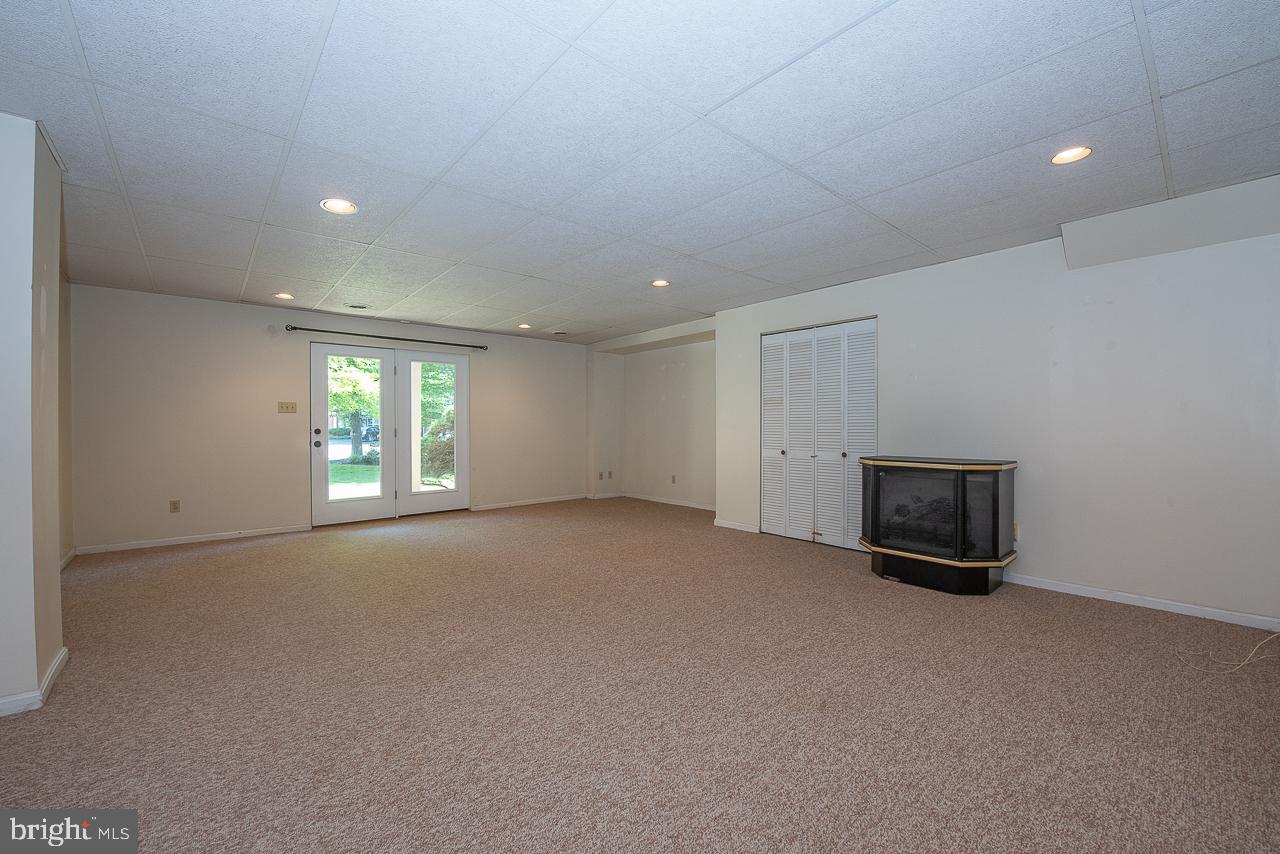 66 Main Street Chesterbrook, PA 19087 - Photo 28 of 37 Lower Level with gas fireplace