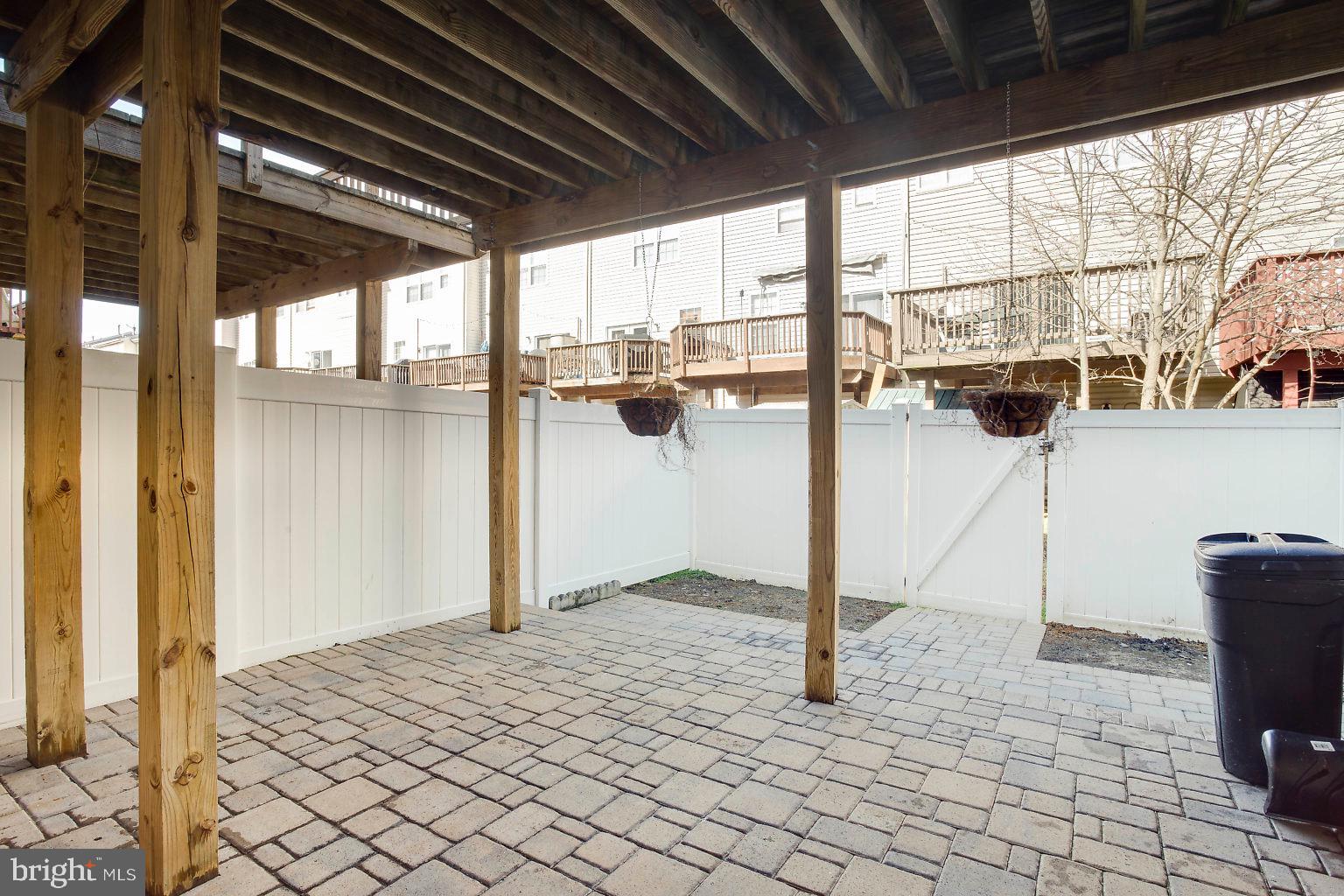 4032 Cutty Sark Road Baltimore, MD 21220 - Photo 32 of 34 Beautiful Patio Pavers and Main level Walk Out