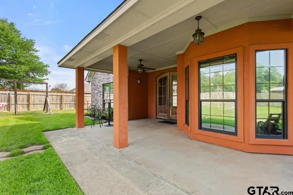 a view of a porch with a backyard