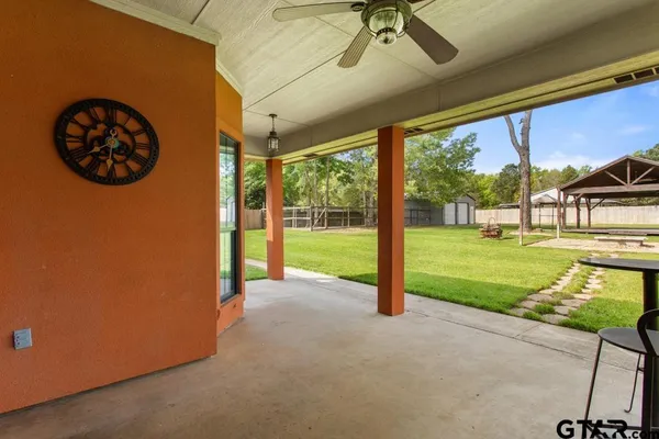 a view of a room with porch and a yard