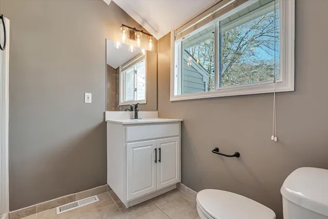 a view of a backyard of the house