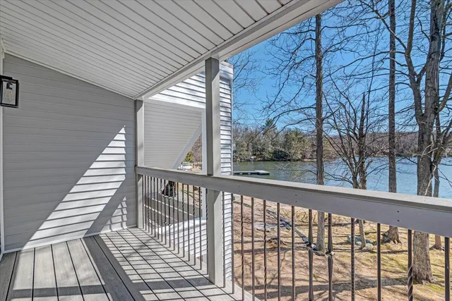 a view of a lake with mountain in the background