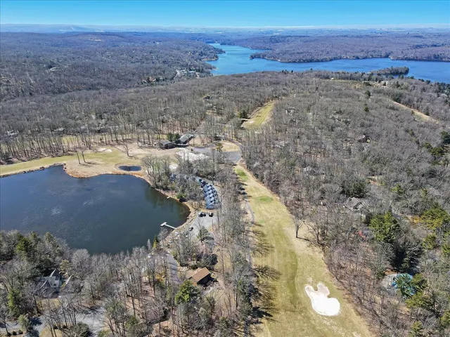 a picture of a bathroom with a shower