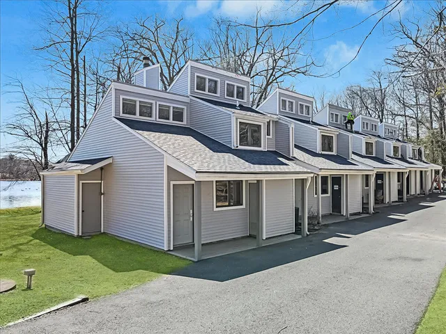 a view of a dining room with furniture and window