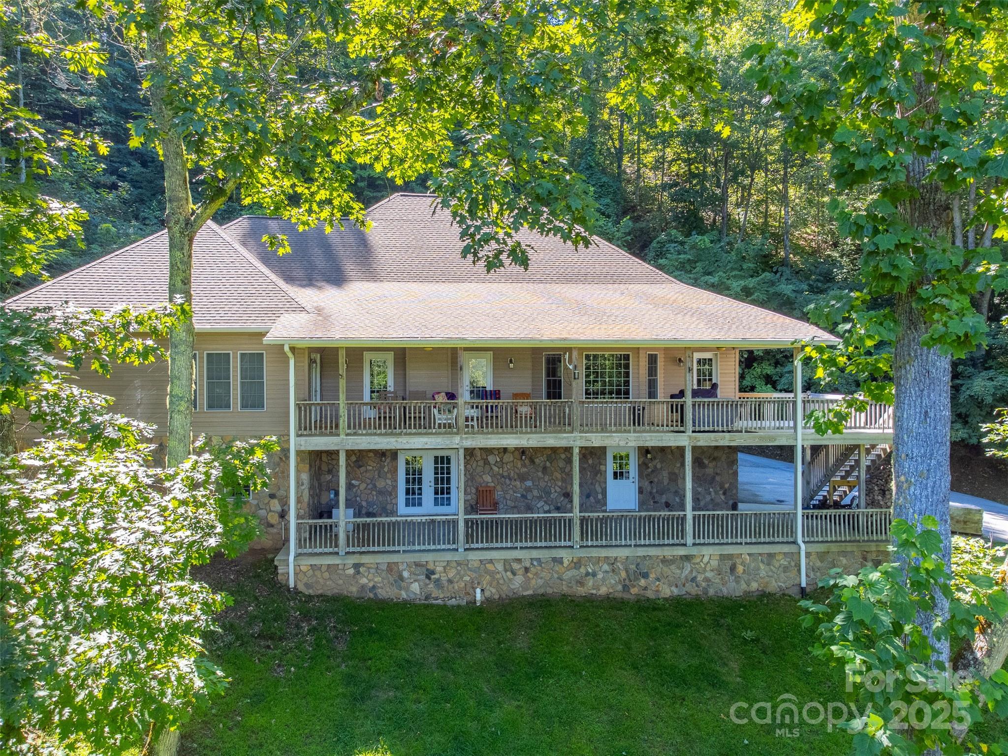 1838 Coman Road Franklin, NC 28734 - Photo 1 of 48 a view of house with a garden