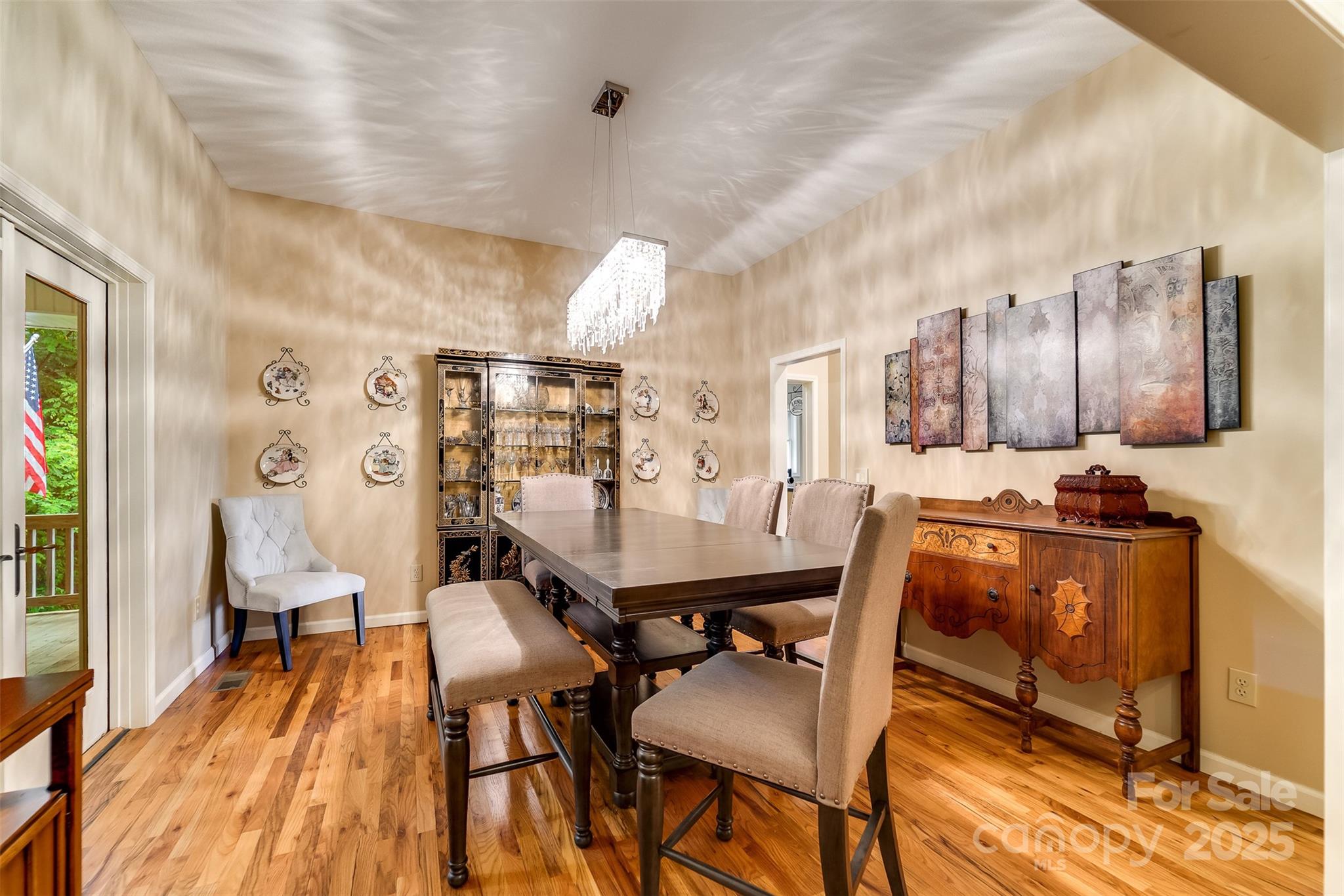 1838 Coman Road Franklin, NC 28734 - Photo 14 of 48 a view of a dining room with furniture and wooden floor